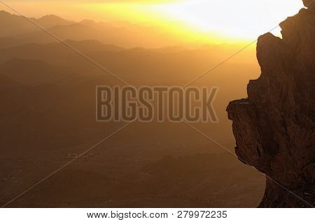 The Sun Rises Behind The Rock. Mysterious Landscape Of Mount Sinai (mount Horeb, Gabal Musa, Moses M