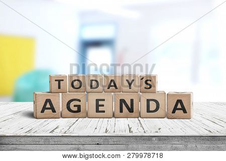 Today's Agenda Sign On A Wooden Desk