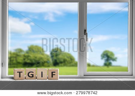 Tgif Weekend Sign In A White Window With A View To Sunshine Over A Beautiful Landscape