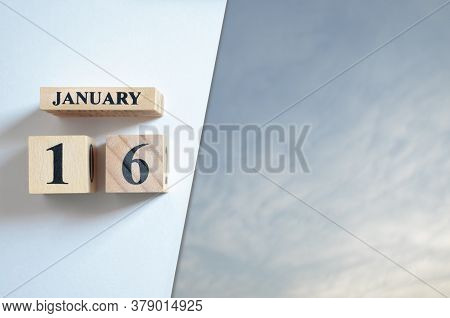 January 16, Blue Sky With Clound With Number Cube.