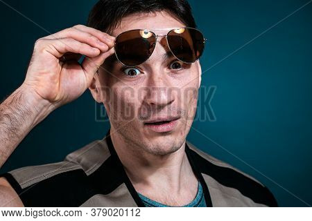 Gay Man Athlete Strong In Sunglasses Portrait