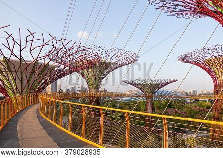 Singapore, Singapore - January 17, 2013. Decorative Towers In Shape Of Tree With Foliage With Telphe
