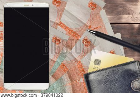 3 Cuban Pesos Convertibles Bills And Smartphone With Purse And Credit Card. E-payments Or E-commerce