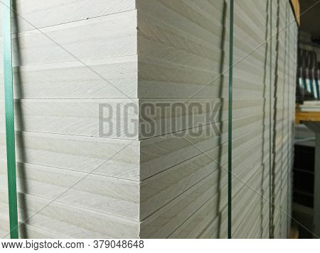 Adjustable Floor, Stacked On A Pallet, Stored At A Construction Site, In A Warehouse, Gray, Construc