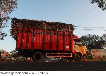 Yogyakarta, Indonesia - July 27, 2020 - Cane Trucks Are Ready To Enter Madukismo Sugar Factory In Yo
