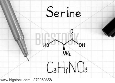 Chemical Formula Of Serine With Pen. Close-up.