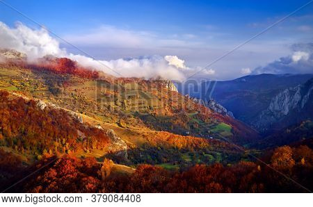 aerial view of Carpathian mountains countryside in autumn morning, Romania