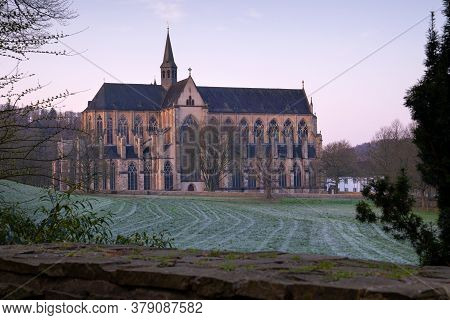 Odenthal, Germany - March 27, 2020: Panoramic Image Of The Altenberg Cathedral In Morning Light On M