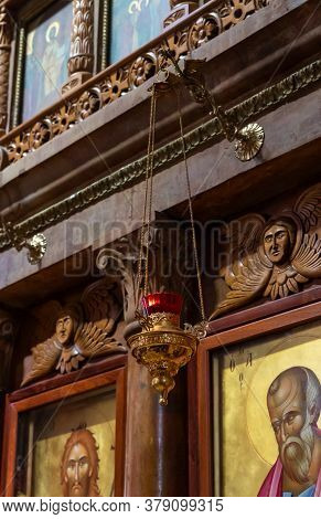 Tiberias, Israel, July 18, 2020 : The Gold Ornamental Lampade Hangs In The Main Hall Of The Church O
