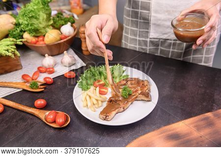 Homemade Pork Chop Steak With Salad. Online Learning For Cooking Diet And Healthy Food When Stay At 