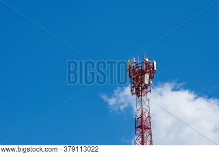 Mobile Tower. Pillar Against The Blue Sky. 5g