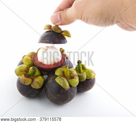A Delicious Ripe Mangosteen On A White Background