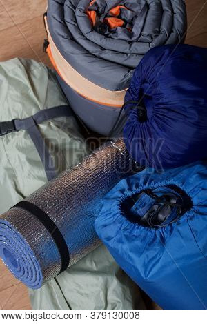 Tourist Equipment. Self-inflating Rugs And Sneakers. Lie On The Floor In The Room.