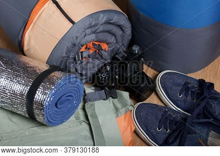 Tourist Equipment. Self-inflating Rugs And Sneakers. Lie On The Floor In The Room.