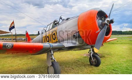 Pilsen / Czech Republic - July 25, 2020:  Historic South African Air Force training plane (SAAF) Harvard Mk.II (AT-6C-15-NT Texan) prepared for take-off on airfield Line.