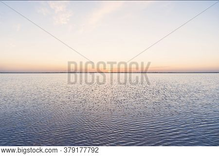 Pink Lake. Striking Red Pool Used In The Production Of Salt Near Rio Lagartos, Mexico, Yucatan. Sun 