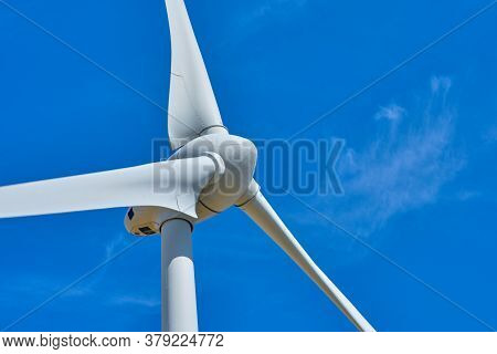 Electricity Wind Generators At Fehmarn Island. Renewable Energy And Environment Concept