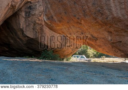 Ameib, Namibia - June 1, 2011: A Vehicle Is Visible Behind Large Granite Boulders At Bulls Party At 