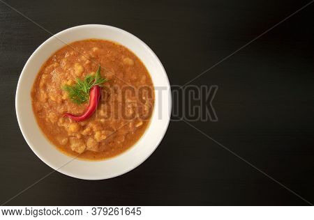 Famous Traditional Arabic Cuisine - Peeled Fava Beans With Chili In White Bowl On Dark Wooden Backgr