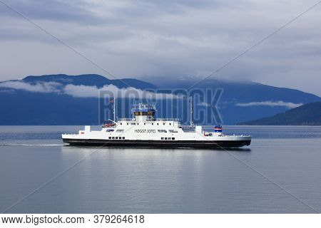 Sognefjord, Norway - July 30, 2020: Passenger And Car Ferry Crosses Sognefjord In Norway. Public Tra
