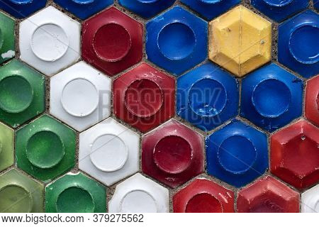 Mosaic Of The Soviet Period In The Form Of Honeycombs On A Concrete Wall.