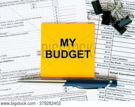 Text My Budget On Note Paper With Pen And Glasses
