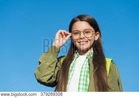 Improved Vision Is Possible. Happy Kid Wear Glasses On Sunny Blue Sky. Defective Vision. Childs Visi
