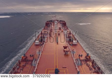 The Feed Of A Ship Sailing In The Arctic. Landscape Of The Arctic From The Deck Of The Tanker.