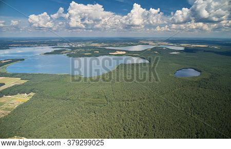 Clean Big Lake In Forest Landscape
