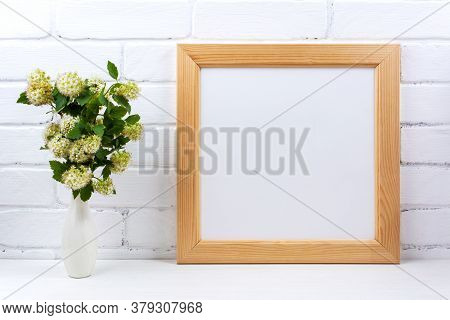 Square Wooden Picture Frame Mockup With White Spirea