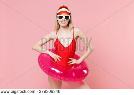 Smiling Blonde Woman Girl In Red One-piece Swimsuit Cap Glasses With Swim Inflatable Ring Isolated O