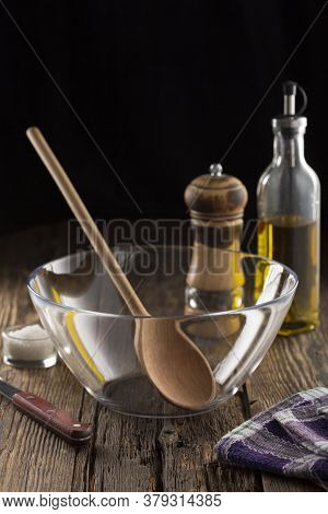 Cooking Concept With Utensils Oil And Spices In Rustic Kitchen Interior. Stopping Or Resuming A Rest