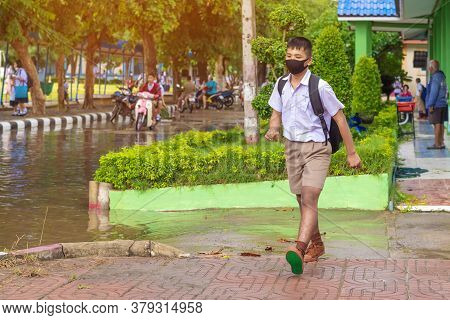 Kanchanaburi,thailand-july 2,2020:thai Students Wear Various Medical Masks To Prevent Themselves Fro