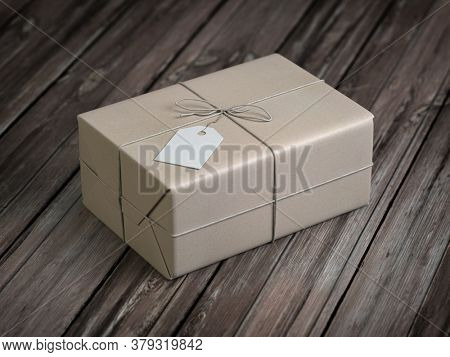 Craft paper gift box with empty label on wooden table. Delivery copncept. 3d illustration