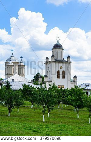 Pasarea Monastery, Orthodox Church Architectural Details. View Of Orthodox Church And Green Churchya