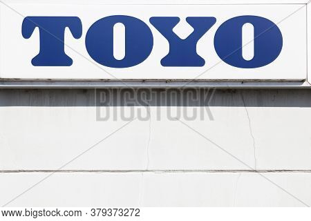 Aarhus, Denmark - August 25, 2019: Toyo Logo On A Wall. Toyo Is A Tire And Rubber Products Company B