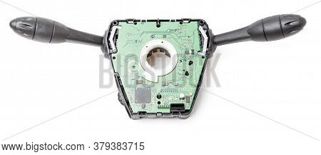 Steering Wheel Switches For Windshield Wipers And Turn Signals Disassembled On A White Isolated Back