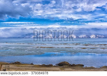 Melting In May On Baikal Ice, And Clouds