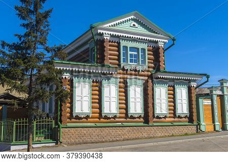 Russia, Irkutsk 06,05,2018 Wooden Architecture Of Siberia. Wooden Houses On Streets In The Center Of