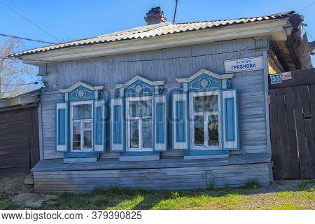 Wooden Architecture Of Siberia. Wooden Houses On Streets In The Center Of Irkutsk