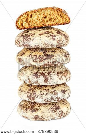 Five Whole And One Broken On Top Gingerbread Cookies In Stack Isolated On A White Background