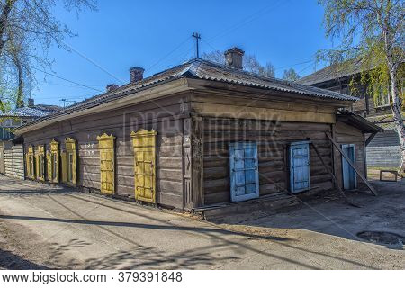 Russia, Irkutsk 06,05,2018 Wooden Architecture Of Siberia. Wooden Houses On Streets In The Center Of