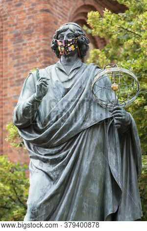 Torun, Poland - June 26, 2020: Nicolaus Copernicus Monument, Statue Of Polish Renaissance Astronomer