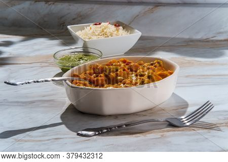 Authentic Indian Vegetable Korma Curry Dinner With Green Chutney And Basmati Rice