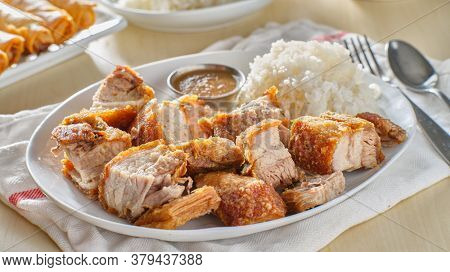 crispy filipino lechon kawali with white rice