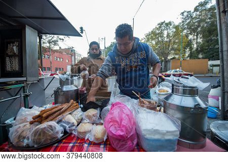 Mexico, Distrito Federal / Mexico - April 8 2014: Omar And His Sister, Street Vendors Serving Tortas