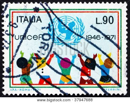 ITALY - CIRCA 1971: a stamp printed in the Italy shows UNICEF Emblem and Children, 25th Anniversary of UNICEF, circa 1971