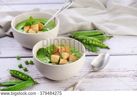 Chilled Soup Puree Of Green Peas,  Seasoned With Green Onion, Mint And Crunchy  Toasted Diced Rusk B