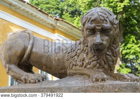 Ancient Sculpture Of Sad Lion Close Up In Palace And Park Ensemble In Village Samchyky. Khmelnytsky 