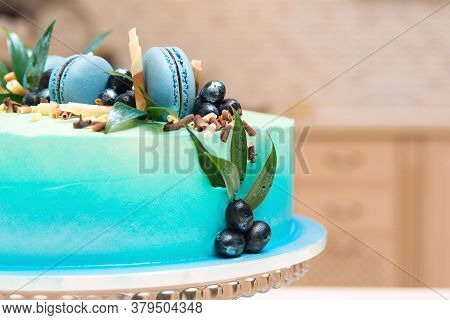Birthday Cake With French Macaroon And Blueberries. Tasty Fruit Cake On The Table.